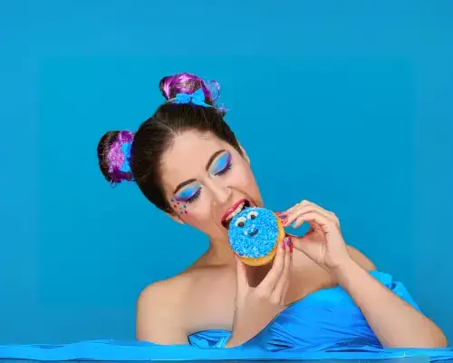 woman eating a donut